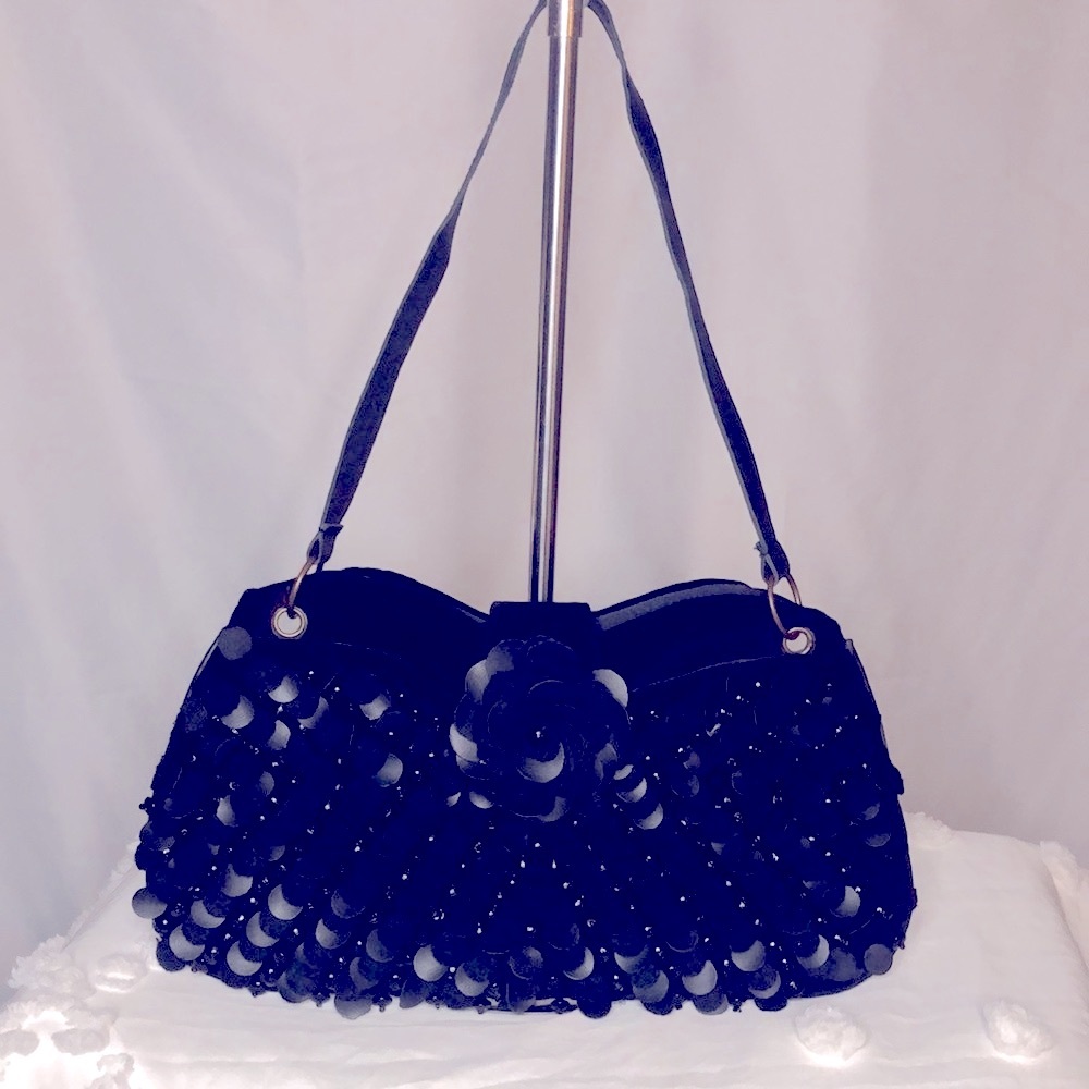 LUNA LLENA black floral design shoulder handbag.